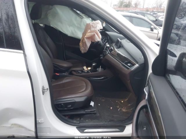 2016 BMW X1 WBXHT3C36G5E55276 Photo 4