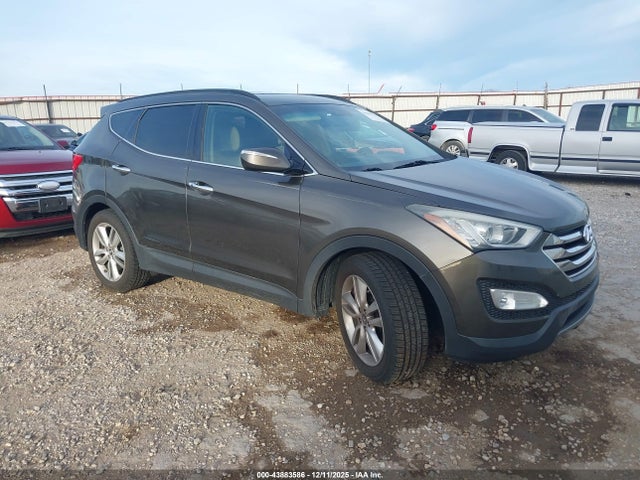 Auction sale of the 2014 Hyundai Santa Fe Sport 2.0l Turbo, vin: 5XYZUDLA8EG200648, lot number: 43883586