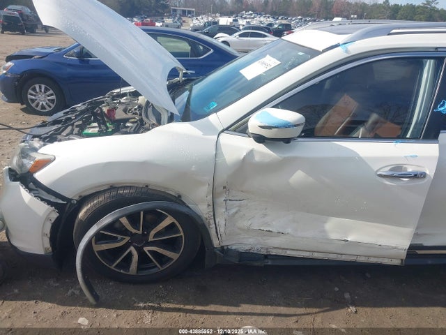 JN8AT2MT0JW485268 Nissan Rogue Sl