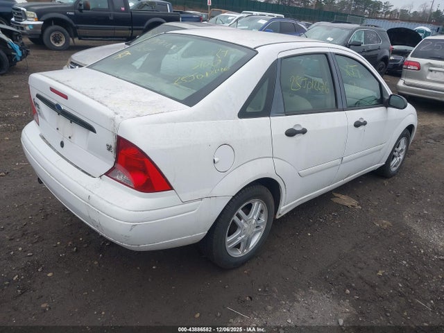 2003 FORD FOCUS 1FAHP34P43W227240 Photo 3