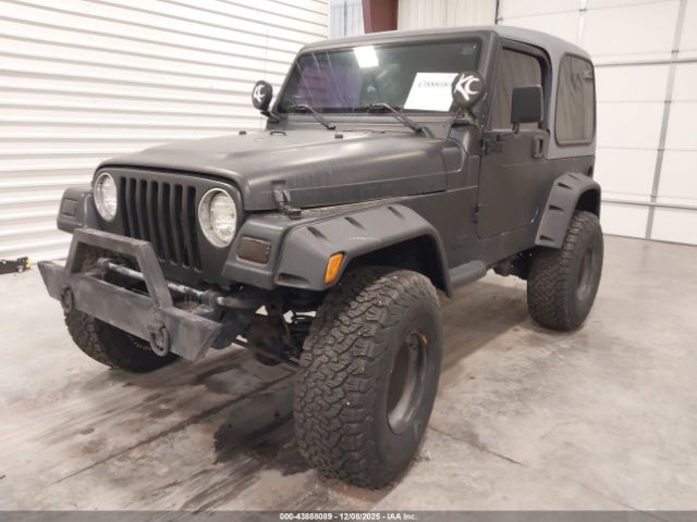 2000 JEEP WRANGLER 1J4FA49S2YP770944 Photo 1