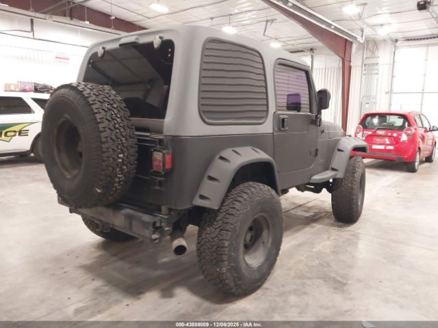 2000 JEEP WRANGLER 1J4FA49S2YP770944 Photo 3