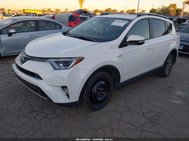 2018 TOYOTA RAV4 HYBRID JTMRJREV0JD198554 Photo 1