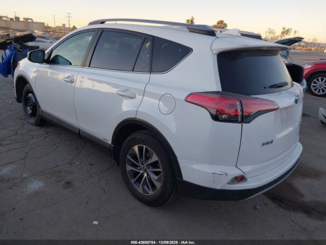 2018 TOYOTA RAV4 HYBRID JTMRJREV0JD198554 Photo 2
