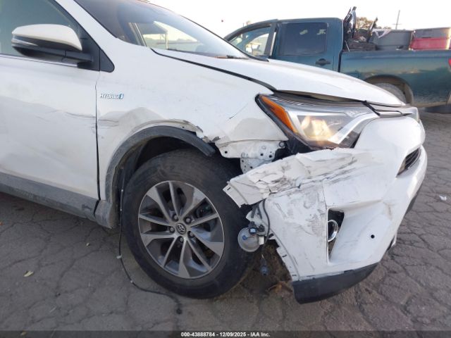 2018 TOYOTA RAV4 HYBRID JTMRJREV0JD198554 Photo 5