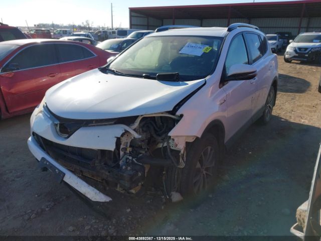 2016 TOYOTA RAV4 HYBRID JTMRJREV1GD059347 Photo 1