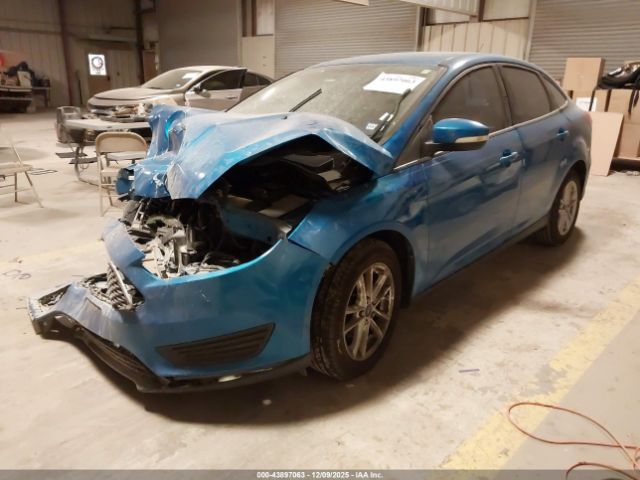 2016 FORD FOCUS 1FADP3F23GL360871 Photo 1