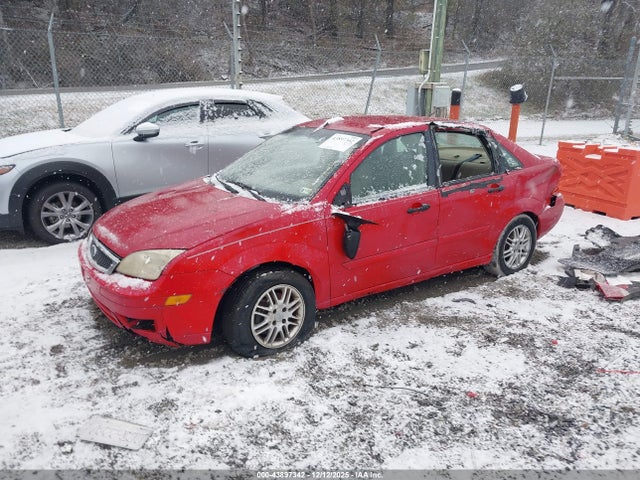 2005 FORD FOCUS 1FAFP34N95W185558 Photo 1