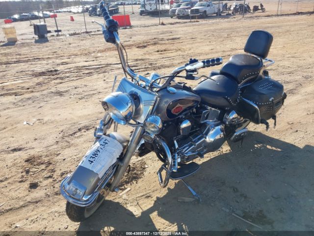 1997 HARLEY-DAVIDSON FLSTC 1HD1BJL48VY043057 Photo 1