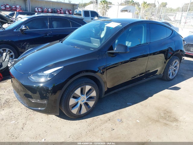 2023 TESLA MODEL Y 7SAYGDED3PF948392 Photo 1