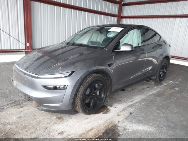 2026 TESLA MODEL Y 7SAYGDEDXTF434131 Photo 1