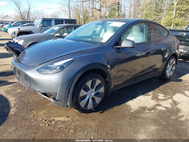 2023 TESLA MODEL Y 7SAYGDEE7PF883698 Photo 1