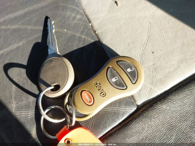 2004 JEEP GRAND CHEROKEE 1J8GW68J74C299870 Photo 10