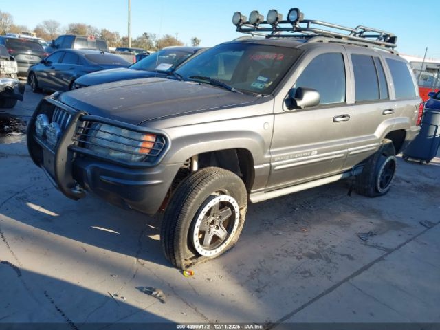 2004 JEEP GRAND CHEROKEE 1J8GW68J74C299870 Photo 1
