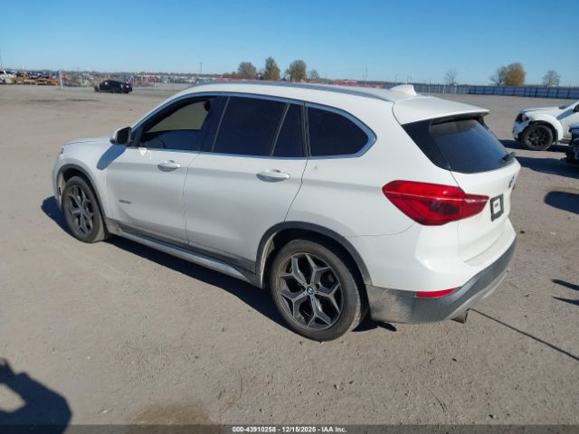 2018 BMW X1 WBXHT3C36J5L25518 Photo 2