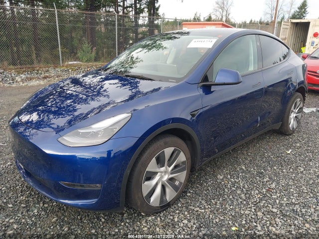 2023 TESLA MODEL Y 7SAYGDEE2PF830942 Photo 1