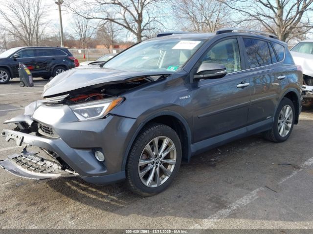 2018 TOYOTA RAV4 HYBRID JTMDJREV9JD162291 Photo 1