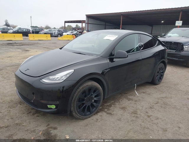 2023 TESLA MODEL Y 7SAYGDEE8PA101552 Photo 1
