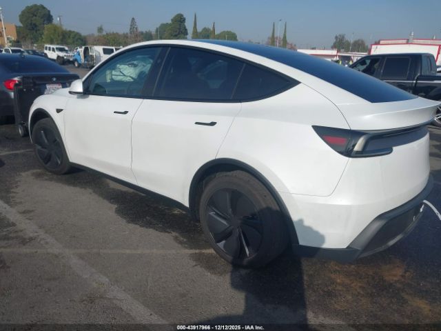 2026 TESLA MODEL Y 7SAYGDED2TF452610 Photo 2
