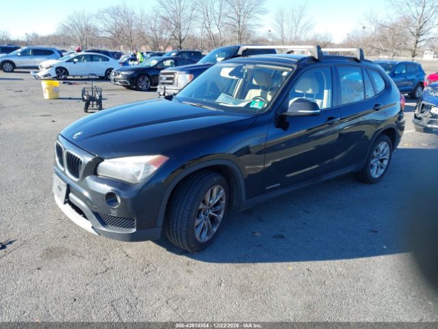 2013 BMW X1 WBAVL1C54DVR83975 Photo 1