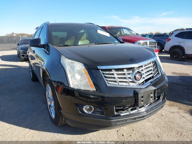 2014 CADILLAC SRX 3GYFNDE37ES638889 Photo 0