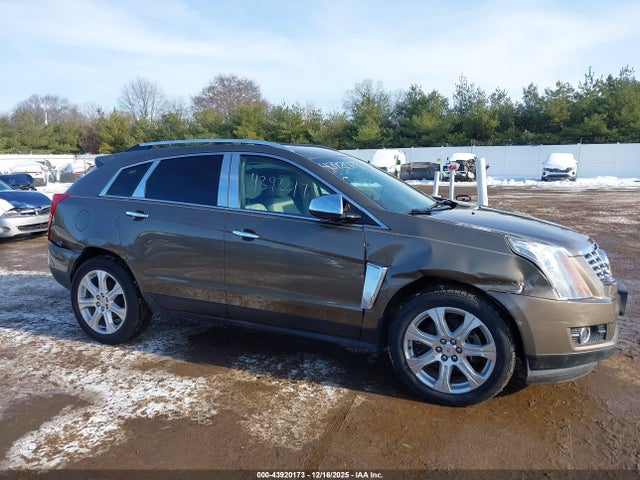 2014 CADILLAC SRX 3GYFNCE30ES567111 Photo 5
