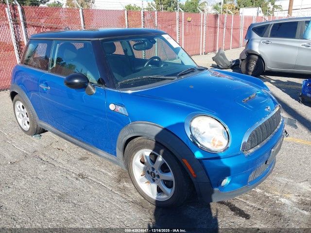2009 MINI COOPER S WMWMF73559TW85430 Photo 0