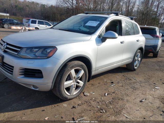 2012 VOLKSWAGEN TOUAREG WVGFF9BPXCD005447 Photo 1