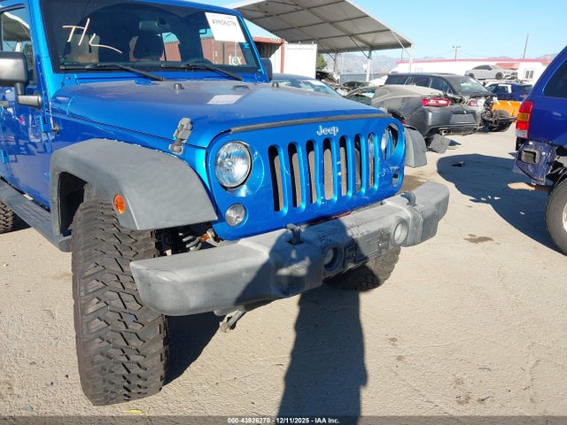 1C4BJWDG9GL177865 Jeep Wrangler Unlimited Sport