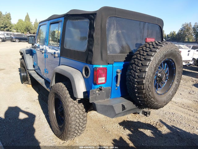 1C4BJWDG9GL177865 Jeep Wrangler Unlimited Sport