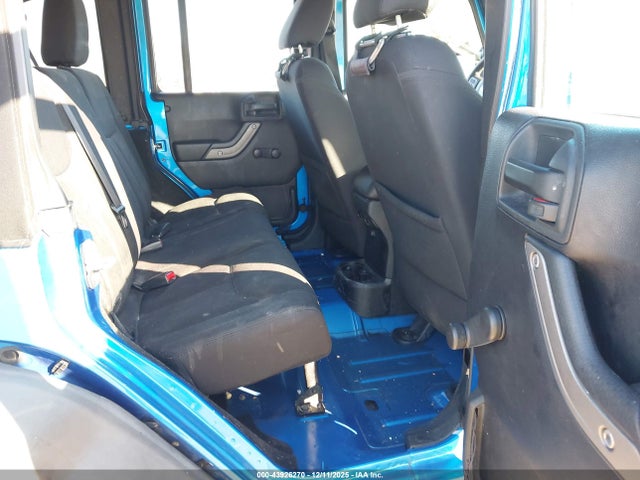 1C4BJWDG9GL177865 Jeep Wrangler Unlimited Sport