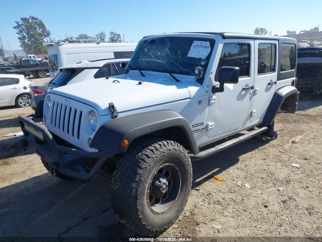 1C4BJWDG9FL570182 Jeep Wrangler Unlimited Sport