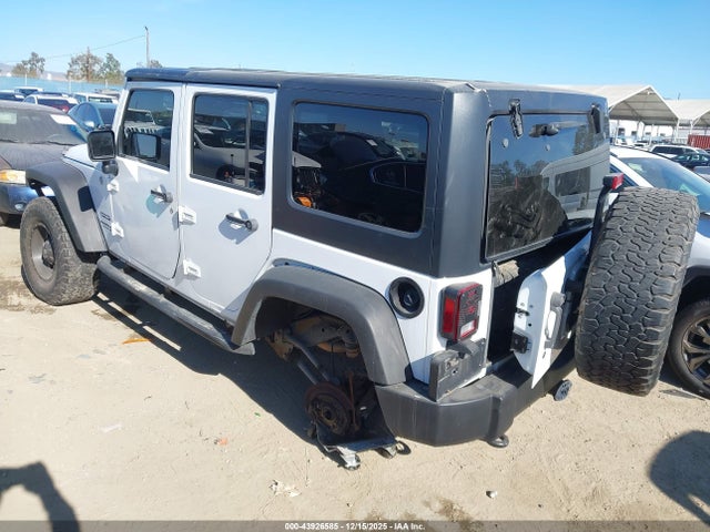 1C4BJWDG9FL570182 Jeep Wrangler Unlimited Sport