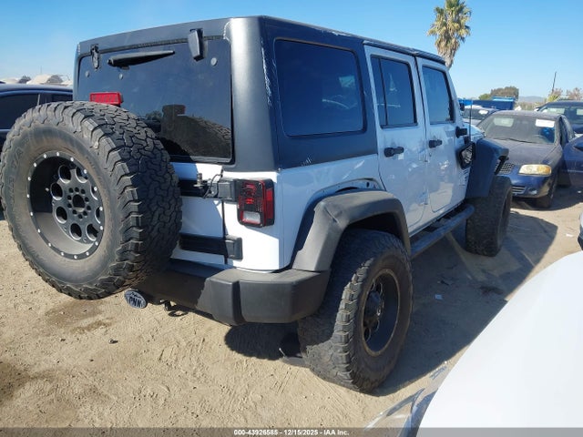1C4BJWDG9FL570182 Jeep Wrangler Unlimited Sport