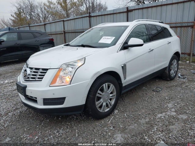 2014 CADILLAC SRX 3GYFNBE3XES682101 Photo 1