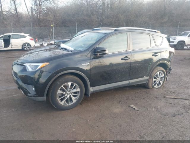 2018 TOYOTA RAV4 HYBRID JTMRJREV4JD172555 Photo 1