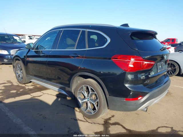 2019 BMW X1 WBXHU7C59K5L10678 Photo 2