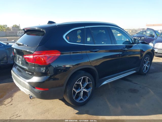2019 BMW X1 WBXHU7C59K5L10678 Photo 3