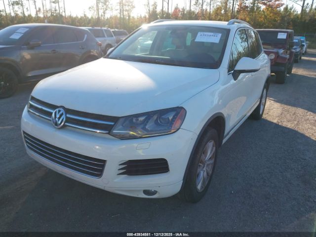 2011 VOLKSWAGEN TOUAREG WVGFF9BP1BD001382 Photo 1