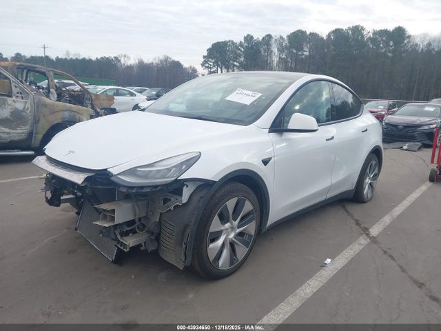 2021 TESLA MODEL Y 5YJYGAEE9MF255004 Photo 1