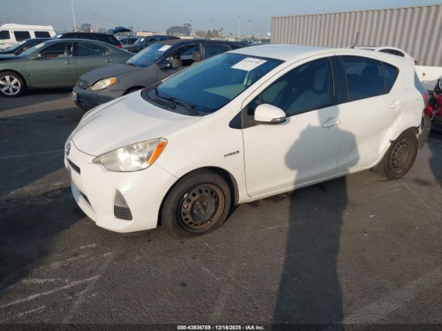 2012 TOYOTA PRIUS C JTDKDTB34C1015377 Photo 1