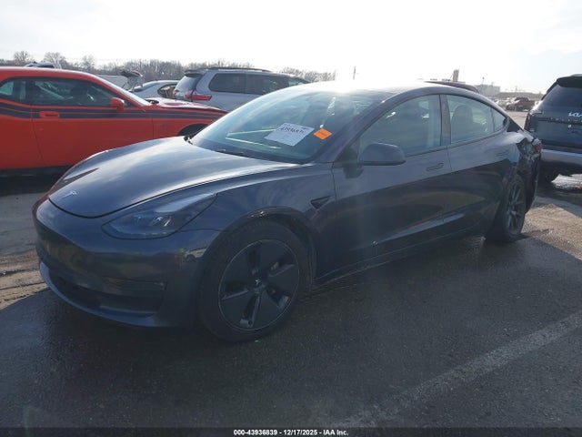2023 TESLA MODEL 3 5YJ3E1EB9PF390915 Photo 1