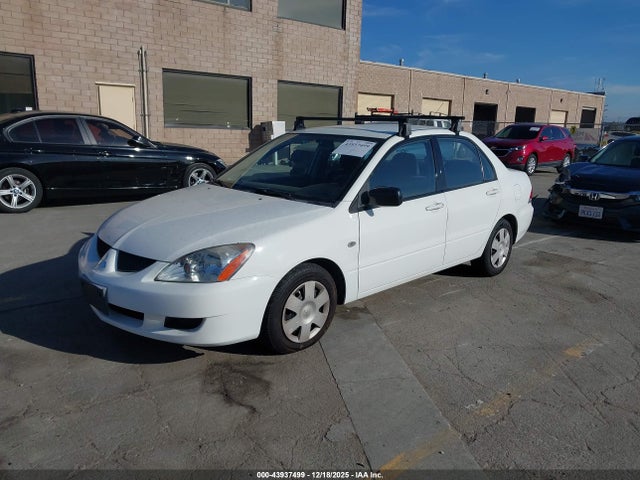 2004 MITSUBISHI LANCER JA3AJ26E94U016047 Photo 1