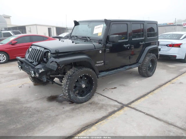 1C4BJWDG7EL149396 Jeep Wrangler Unlimited Sport