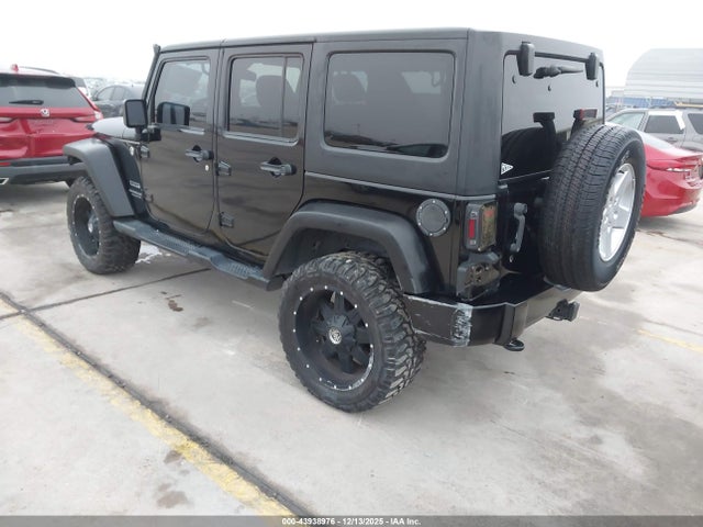 1C4BJWDG7EL149396 Jeep Wrangler Unlimited Sport