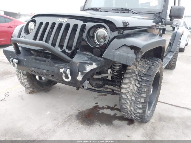 1C4BJWDG7EL149396 Jeep Wrangler Unlimited Sport