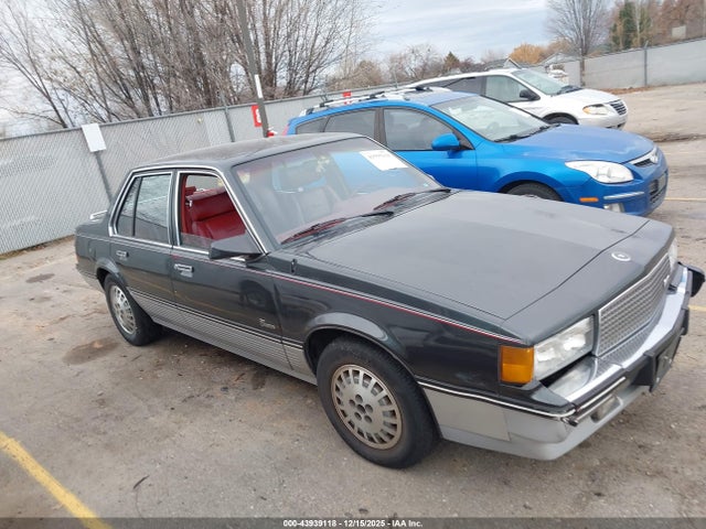 1988 CADILLAC CIMARRON 1G6JG51W9JJ503704 Photo 0