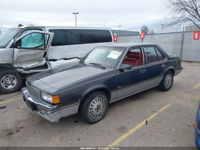 1988 CADILLAC CIMARRON 1G6JG51W9JJ503704 Photo 1