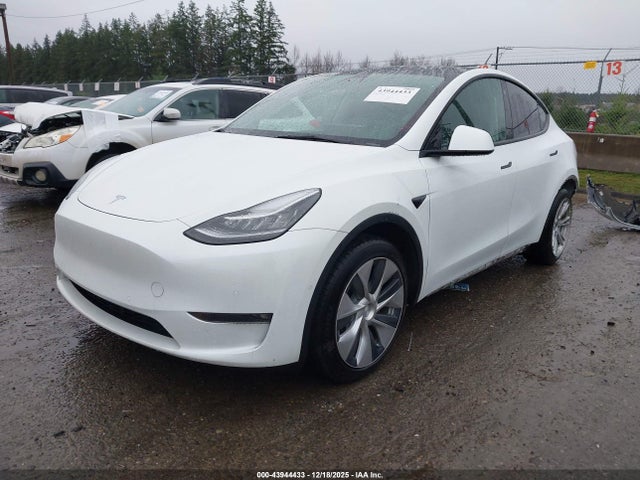 2021 TESLA MODEL Y 5YJYGAEE0MF214146 Photo 1