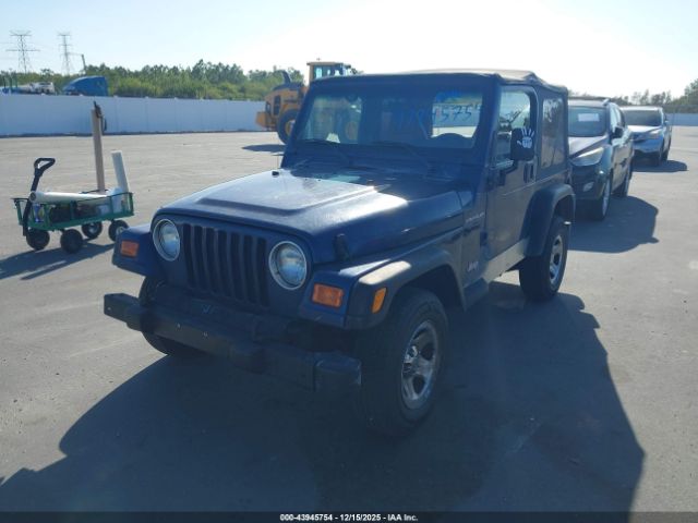 2002 JEEP WRANGLER 1J4FA39S12P769995 Photo 1